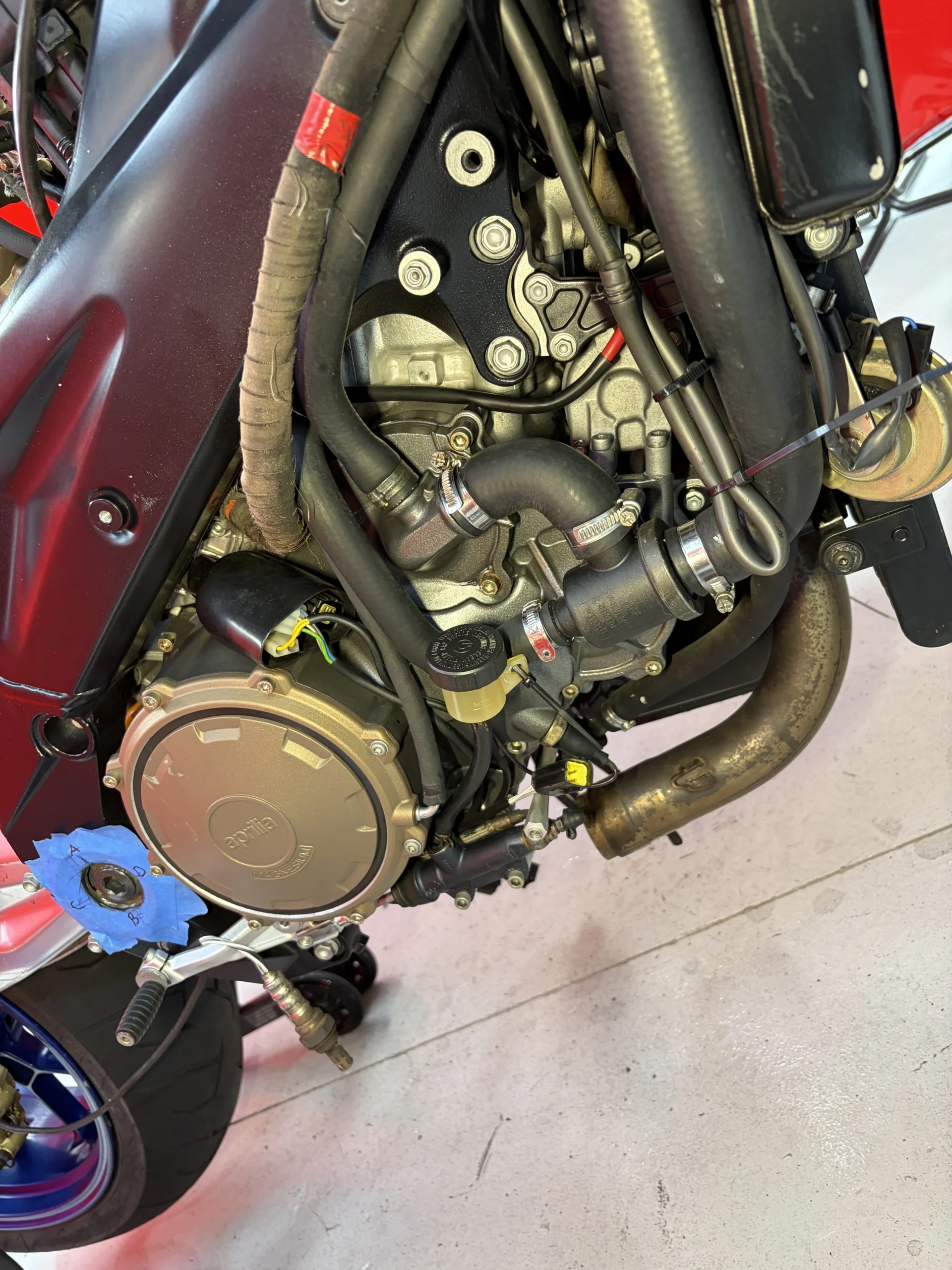 2005 Aprilia RSV1000R right-side engine cases and clutch cover after dry ice blasting, clean alloy with decals and anodising intact