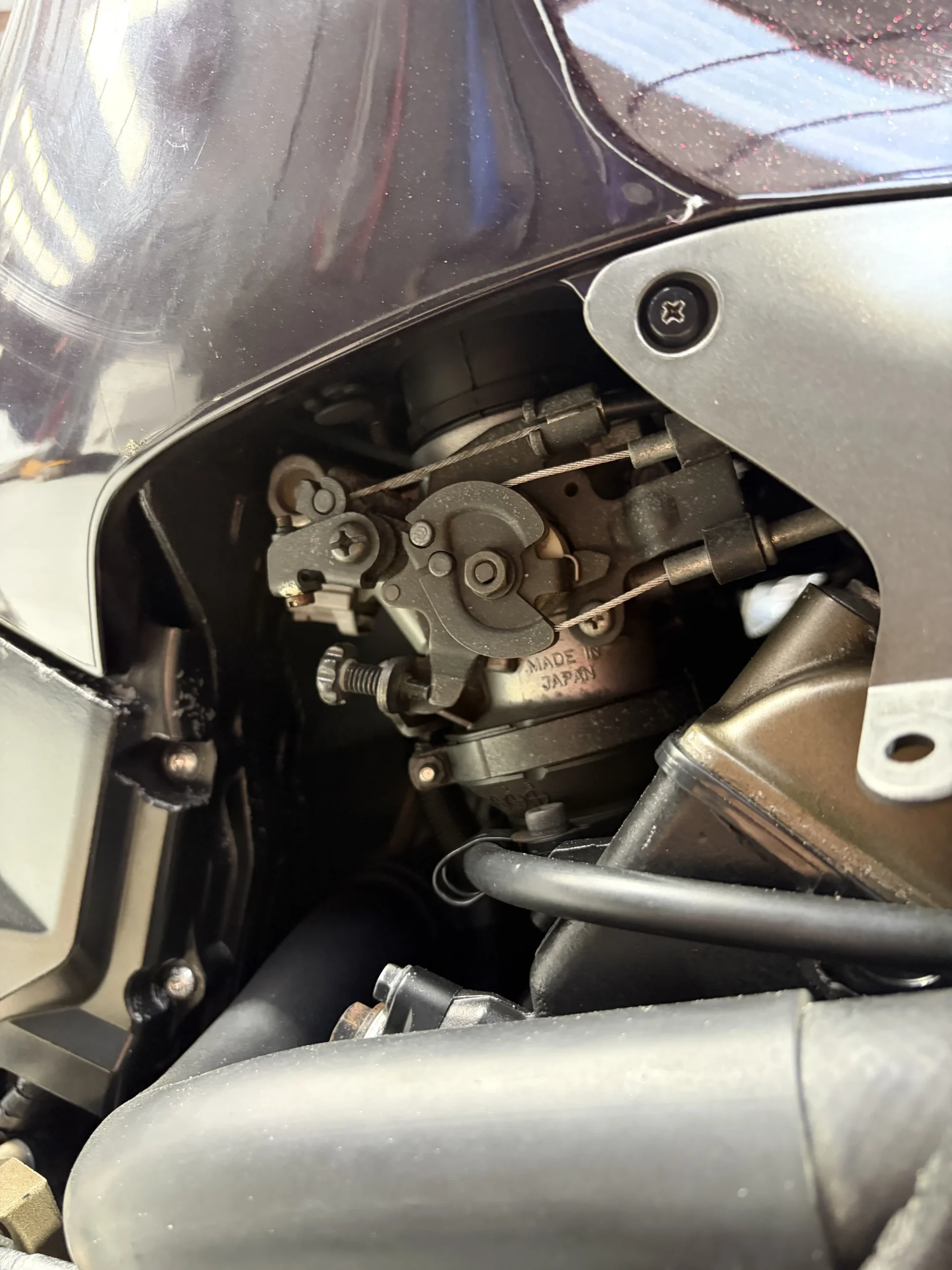 2004 Kawasaki ZX-12R throttle bodies and headers after dry ice blasting, clean with decals and anodising intact